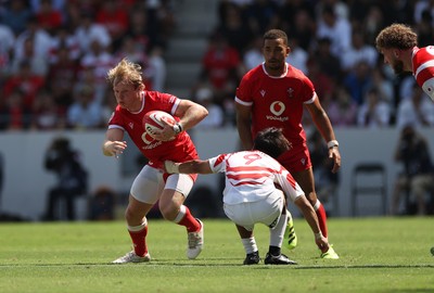050725 - Japan v Wales - Summer Tour First Test - Blair Murray of Wales is tackled by Shinobu Fujiwara of Japan 