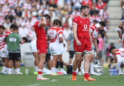 050725 - Japan v Wales - Summer Tour First Test - Josh Adams of Wales during a water break