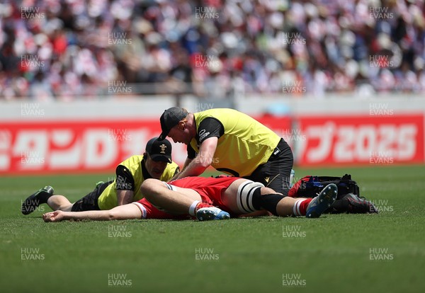 050725 - Japan v Wales - Summer Tour First Test - Ben Carter of Wales goes down injured