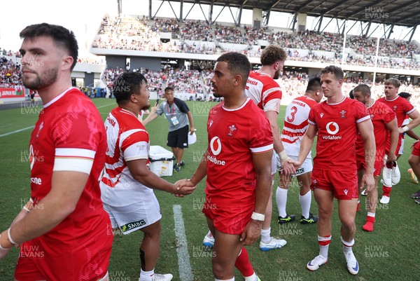 050725 - Japan v Wales - Summer Tour First Test - Ben Thomas of Wales shakes hands with the opposition at full time