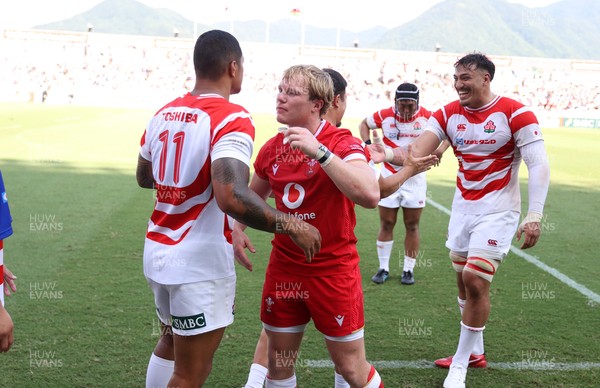 050725 - Japan v Wales - Summer Tour First Test - Blair Murray of Wales shakes hands with the opposition at full time