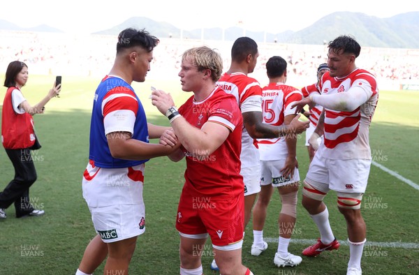 050725 - Japan v Wales - Summer Tour First Test - Blair Murray of Wales shakes hands with the opposition at full time