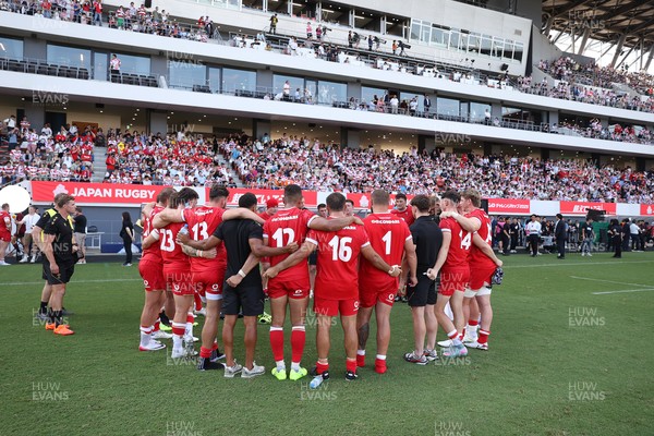 050725 - Japan v Wales - Summer Tour First Test - Wales team huddle at full time