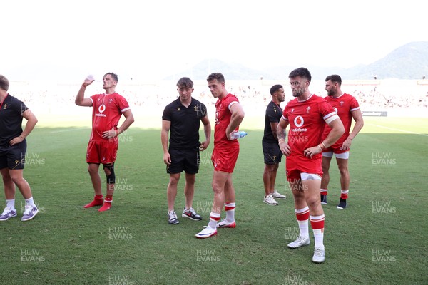 050725 - Japan v Wales - Summer Tour First Test - Alex Mann, Kieran Hardy and Joe Roberts of Wales at full time
