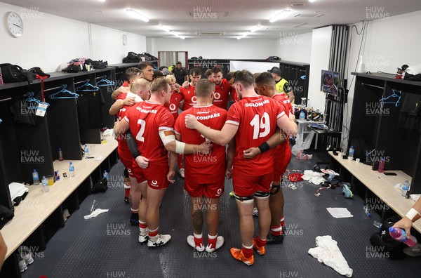 050725 - Japan v Wales - Summer Tour First Test - Wales team huddle in the dressing room