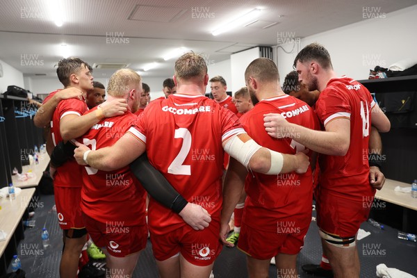 050725 - Japan v Wales - Summer Tour First Test - Wales team huddle in the dressing room