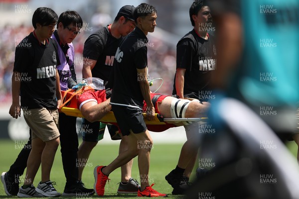 050725 - Japan v Wales - Summer Tour First Test - Ben Carter of Wales is taken off the field injured