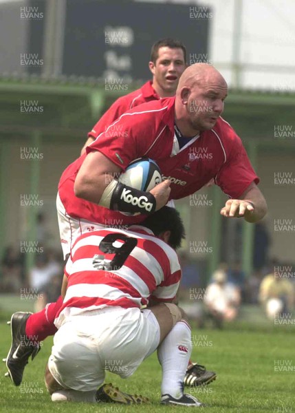 100601 - Japan v Wales - Craig Quinnell bursts through Wataru Murata