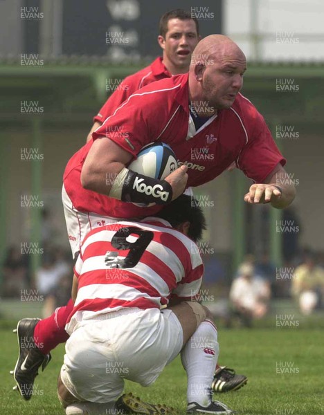 100601 - Japan v Wales - Craig Quinnell bursts through Wataru Murata