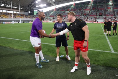 120725 - Japan v Wales - Summer Series - Second Test - Captains Michael Leitch of Japan and Dewi Lake of Wales during the coin toss
