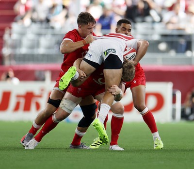 120725 - Japan v Wales - Summer Series - Second Test - Dylan Riley of Japan is tackled by Aaron Wainwright of Wales 