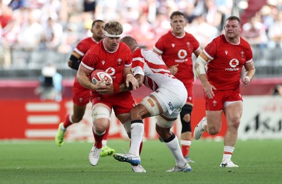 120725 - Japan v Wales - Summer Series - Second Test - Aaron Wainwright of Wales is tackled by Michael Leitch of Japan 