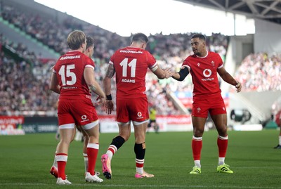 120725 - Japan v Wales - Summer Series - Second Test - Josh Adams of Wales celebrates scoring a try with team mates