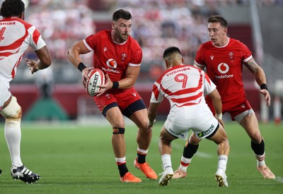 120725 - Japan v Wales - Summer Series - Second Test - Johnny Williams of Wales is challenged by Naito Sato of Japan 