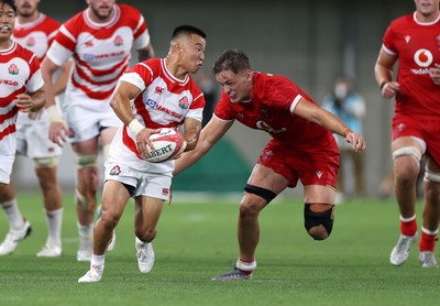 120725 - Japan v Wales - Summer Series - Second Test - Naito Sato of Japan is tackled by Alex Mann of Wales 
