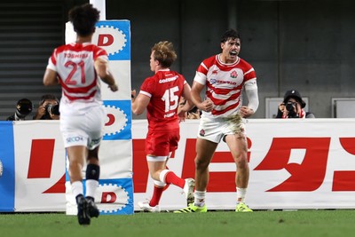 120725 - Japan v Wales - Summer Series - Second Test - Dylan Riley of Japan celebrates scoring a try