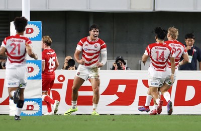 120725 - Japan v Wales - Summer Series - Second Test - Dylan Riley of Japan celebrates scoring a try