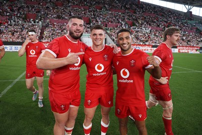 120725 - Japan v Wales - Summer Series - Second Test - Gareth Thomas, Reuben Morgan-Williams and Keelan Giles of Wales celebrate at full time