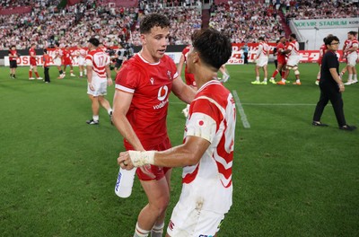 120725 - Japan v Wales - Summer Series - Second Test - Kieran Hardy of Wales shakes hands with the opposition