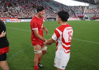 120725 - Japan v Wales - Summer Series - Second Test - Teddy Williams of Wales shakes hands with the opposition
