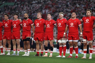 120725 - Japan v Wales - Summer Series - Second Test - Kieran Hardy, Tom Rogers, Josh Macleod, Archie Griffin, Josh Adams, Aaron Wainwright, Chris Coleman and Taine Plumtree sing the anthem