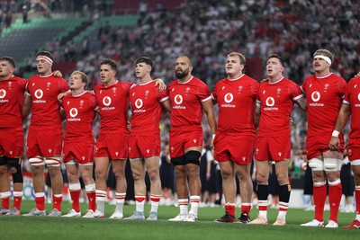120725 - Japan v Wales - Summer Series - Second Test - Freddie Thomas, Blair Murray, Kieran Hardy, Tom Rogers, Josh Macleod, Archie Griffin, Josh Adams and Taine Plumtree sing the anthem