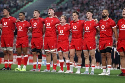 120725 - Japan v Wales - Summer Series - Second Test - Teddy Williams, Ben Thomas, Alex Mann, Freddie Thomas, Blair Murray, Kieran Hardy, Tom Rogers and Josh Macleod sing the anthem