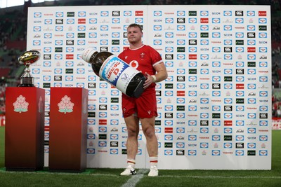 120725 - Japan v Wales - Summer Series - Second Test - Dewi Lake of Wales with the sponsor trophy 
