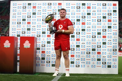 120725 - Japan v Wales - Summer Series - Second Test - Dewi Lake of Wales with the sponsor trophy 