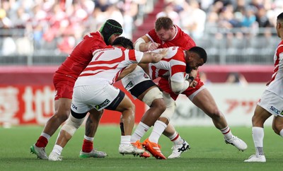 120725 - Japan v Wales - Summer Series - Second Test - Faulua Makisi of Japan is tackled by Nicky Smith and Dewi Lake of Wales 