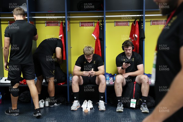 120725 - Japan v Wales - Summer Series - Second Test - Aaron Wainwright and James Ratti of Wales in the dressing room