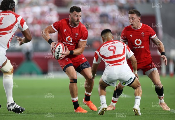 120725 - Japan v Wales - Summer Series - Second Test - Johnny Williams of Wales is challenged by Naito Sato of Japan 