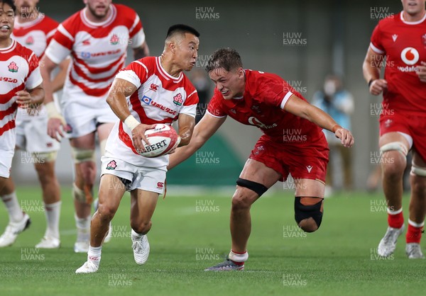 120725 - Japan v Wales - Summer Series - Second Test - Naito Sato of Japan is tackled by Alex Mann of Wales 