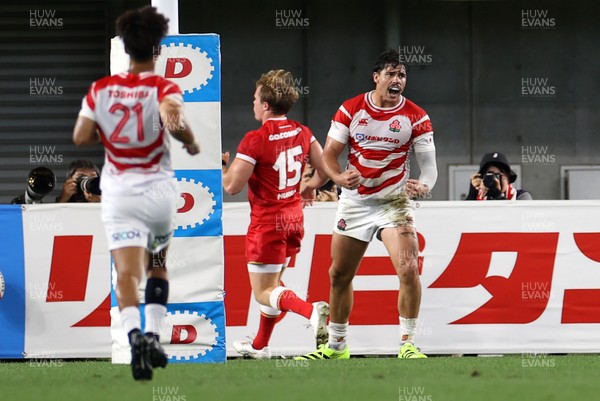 120725 - Japan v Wales - Summer Series - Second Test - Dylan Riley of Japan celebrates scoring a try