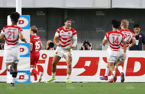 120725 - Japan v Wales - Summer Series - Second Test - Dylan Riley of Japan celebrates scoring a try