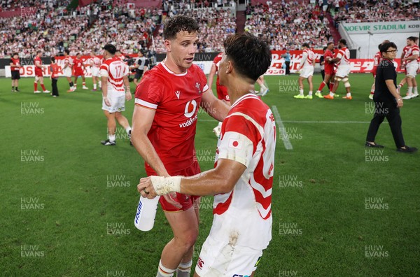 120725 - Japan v Wales - Summer Series - Second Test - Kieran Hardy of Wales shakes hands with the opposition