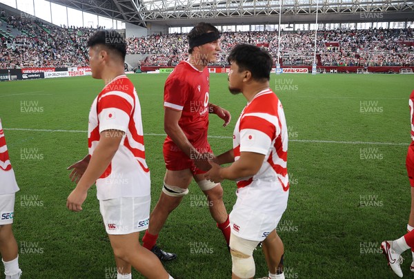 120725 - Japan v Wales - Summer Series - Second Test - Teddy Williams of Wales shakes hands with the opposition