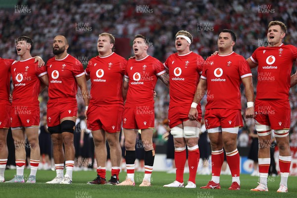 120725 - Japan v Wales - Summer Series - Second Test - Tom Rogers, Josh Macleod, Archie Griffin, Josh Adams, Aaron Wainwright, Chris Coleman and Taine Plumtree sing the anthem