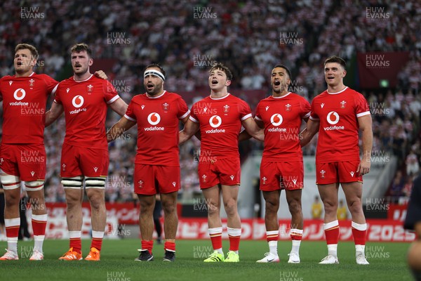 120725 - Japan v Wales - Summer Series - Second Test - Taine Plumtree, James Ratti, Liam Belcher, Dan Edwards, Keelan Giles and Reuben Morgan-Williams sing the anthem