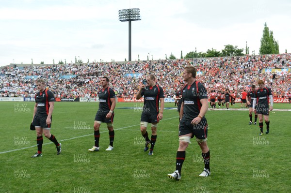 150613 - Japan v Wales -Wales players look dejected at the end of the game