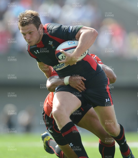 150613 - Japan v Wales -Dan Biggar of Wales tries to beat the defence