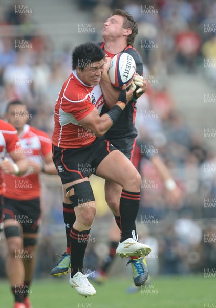 150613 - Japan v Wales -Dan Biggar of Wales and Harumichi Tatekawa of Japan compete