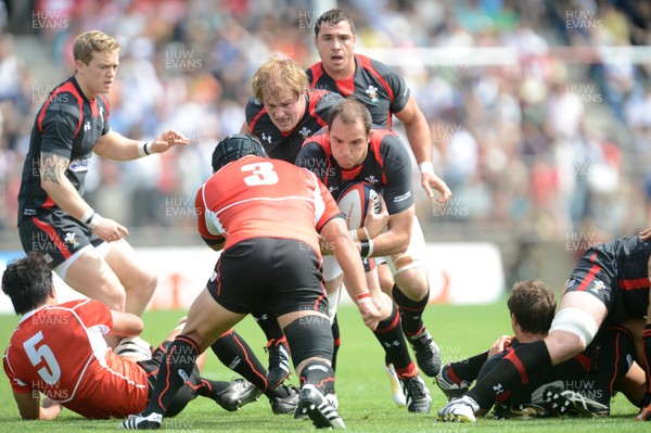 150613 - Japan v Wales -Lou Reed of Wales takes on Hiroshi Yamashita of Japan