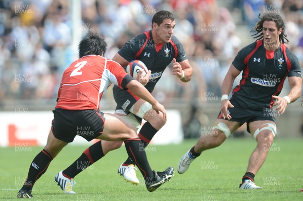 150613 - Japan v Wales -Andries Pretorius of Wales tries to get past Shota Horie of Japan