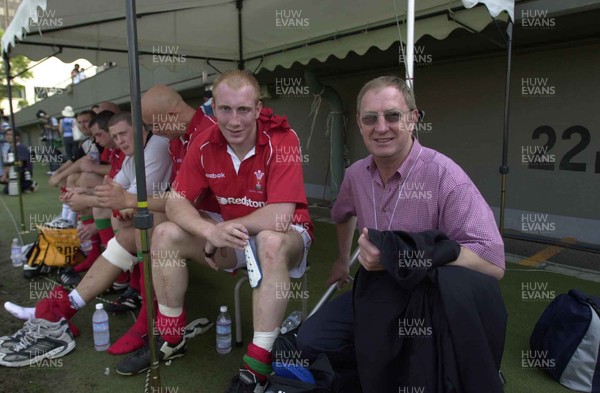 170601- Japan v Wales - Debut try scoring hero Tom Shanklin watches from the bench with his father Jim after he was injured