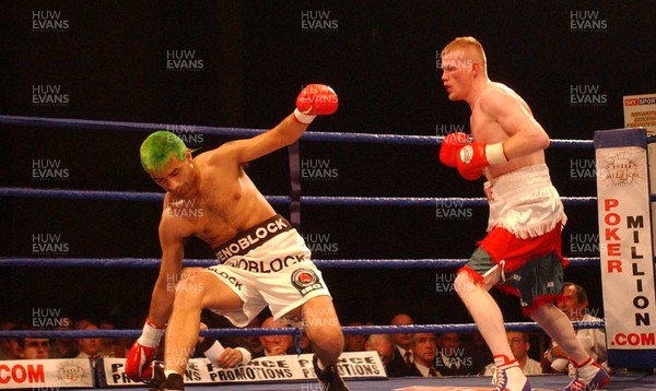 081103 - Jason Cook v Ariel Olveira - IBO Lightweight Championship of the World - Bridgend Recreation Centre - Jason Cook puts Ariel Olveira down in the first