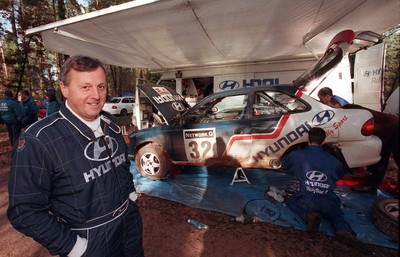 211197 - Jimmy McRae at the Hyundai service area with his car ahead of the RAC Rally