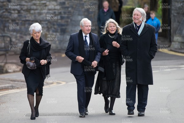 060521 - John Dawes Funeral, Llandaff Cathedral, Cardiff - Sir Gareth Edwards, with wife Maureen left, and JPR Williams , with his wife Cilla, at the funeral of former Wales and British Lions captain and coach John Dawes at Llandaff Cathedral, Cardiff
