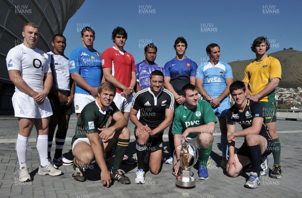 010612 - Junior World Championship - The 12 captains with the IRB Junior World Championship trophy at the official launch in Cape Town Back row: Chris Walker (ENG), Matayavusa Lea (FJI), Giovanni Maistri (ITA), Cory Hill (WAL), Ropeti Lafo (SAM), Karl Chateau (FRA), Sebastian Poet (ARG), Liam Gill (AUS) Front row: Wian Liebenberg (RSA), Bryn Hall (NZL), Niall Scannell (IRE), Harry Leonard (SCO)