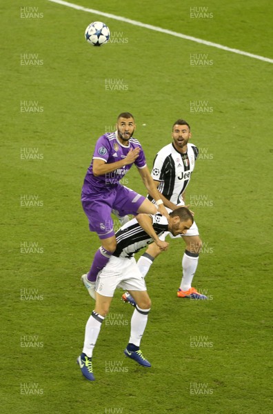 030617 - UEFA Champions League Final - Juventus v Real Madrid - Karim Benzema of Real Madrid gets above Leonardo Bonucci of Juventus